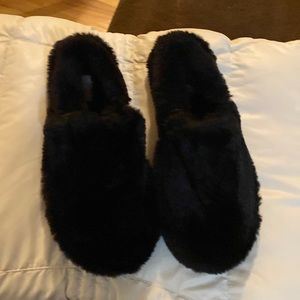 Black fur house slippers.